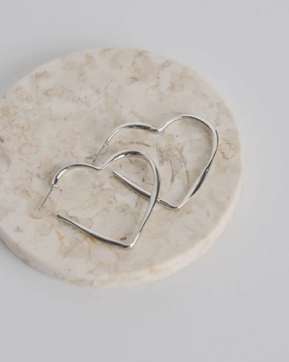Heart-Shaped Hoops sold by Reitmans