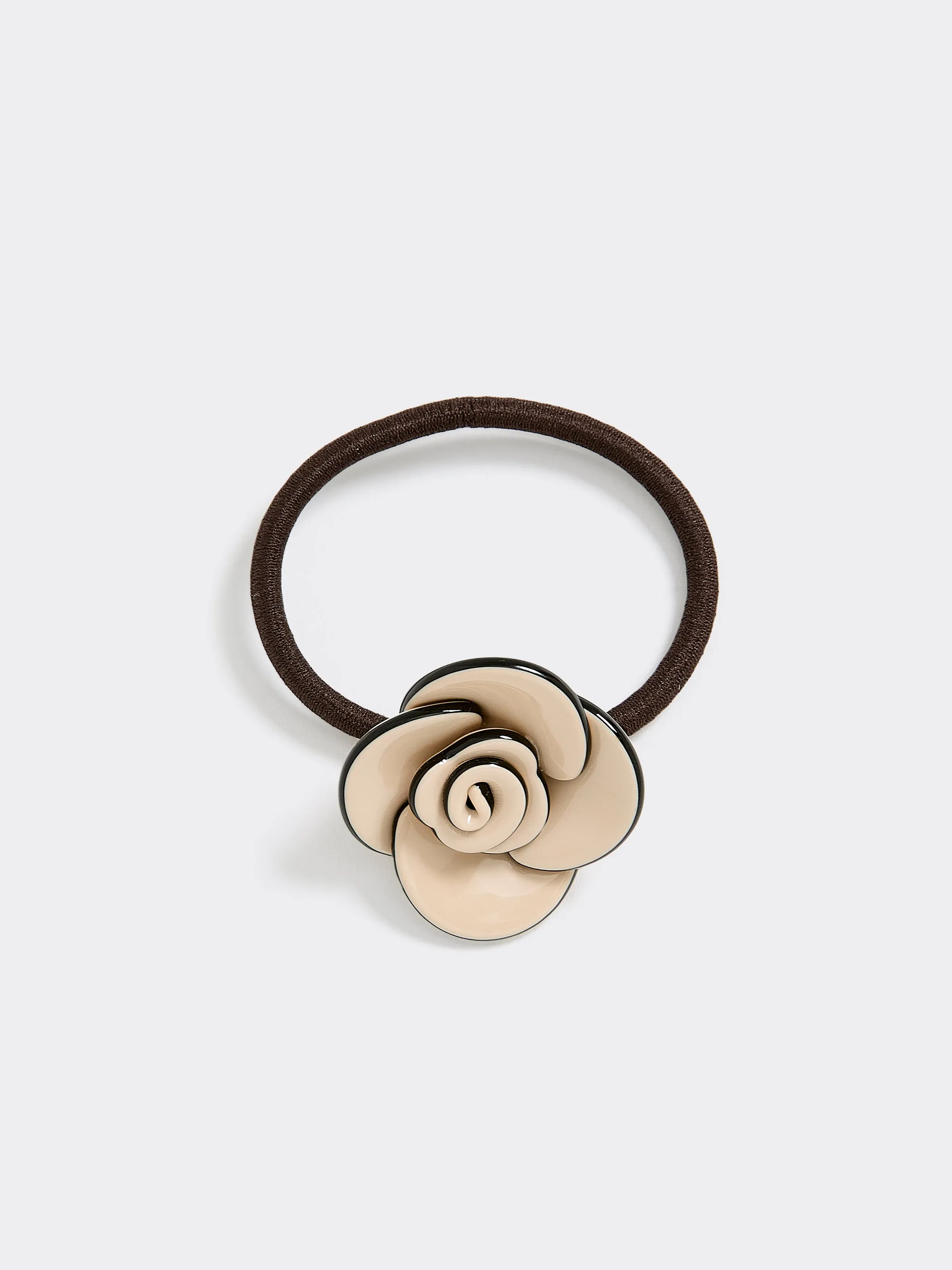 Hair Tie with Flower sold by Reitmans