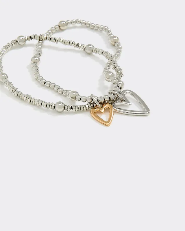 Beaded Bracelets with Heart Charms - Set of 2 sold by Reitmans