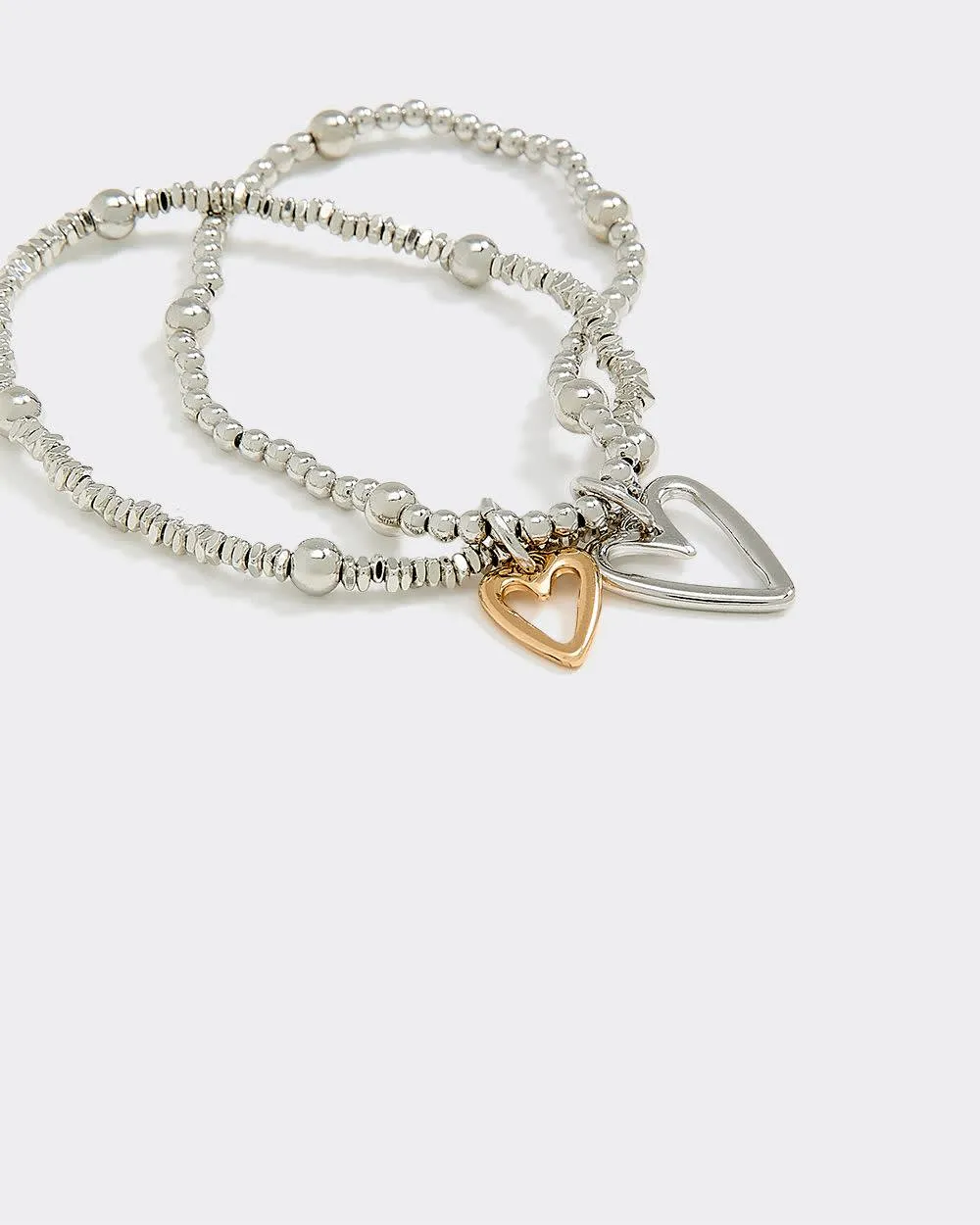 Beaded Bracelets with Heart Charms - Set of 2 sold by Reitmans