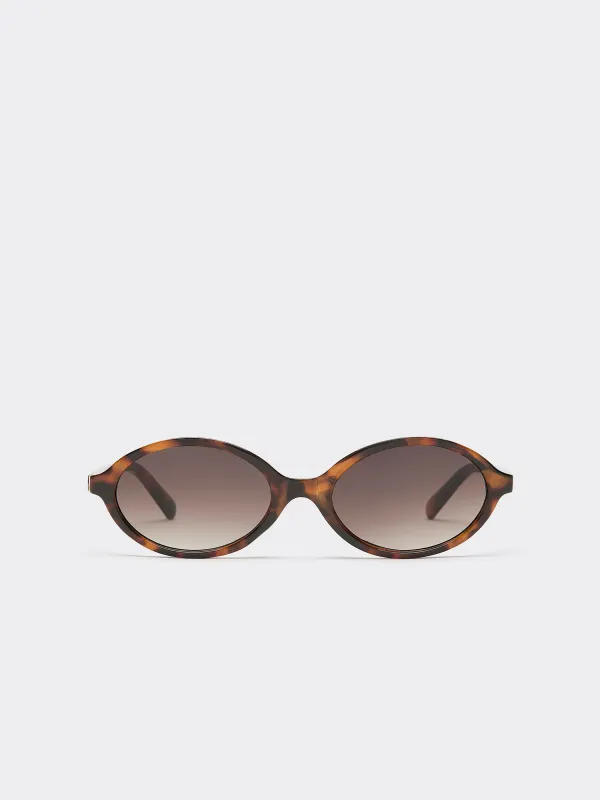 Retro Oval Sunglasses sold by Reitmans