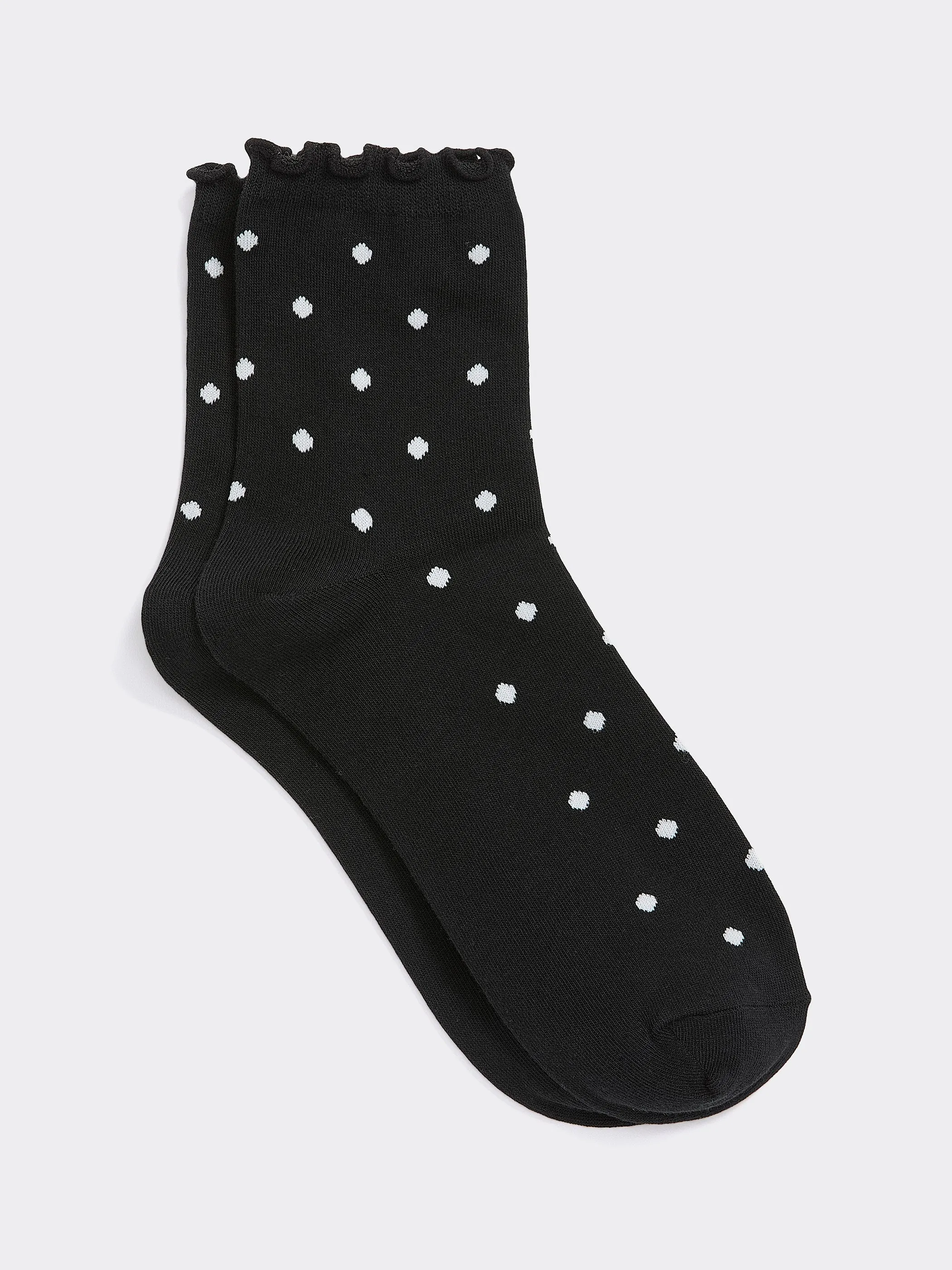 Dotted Anklet Socks with Ruffled Hems sold by Reitmans