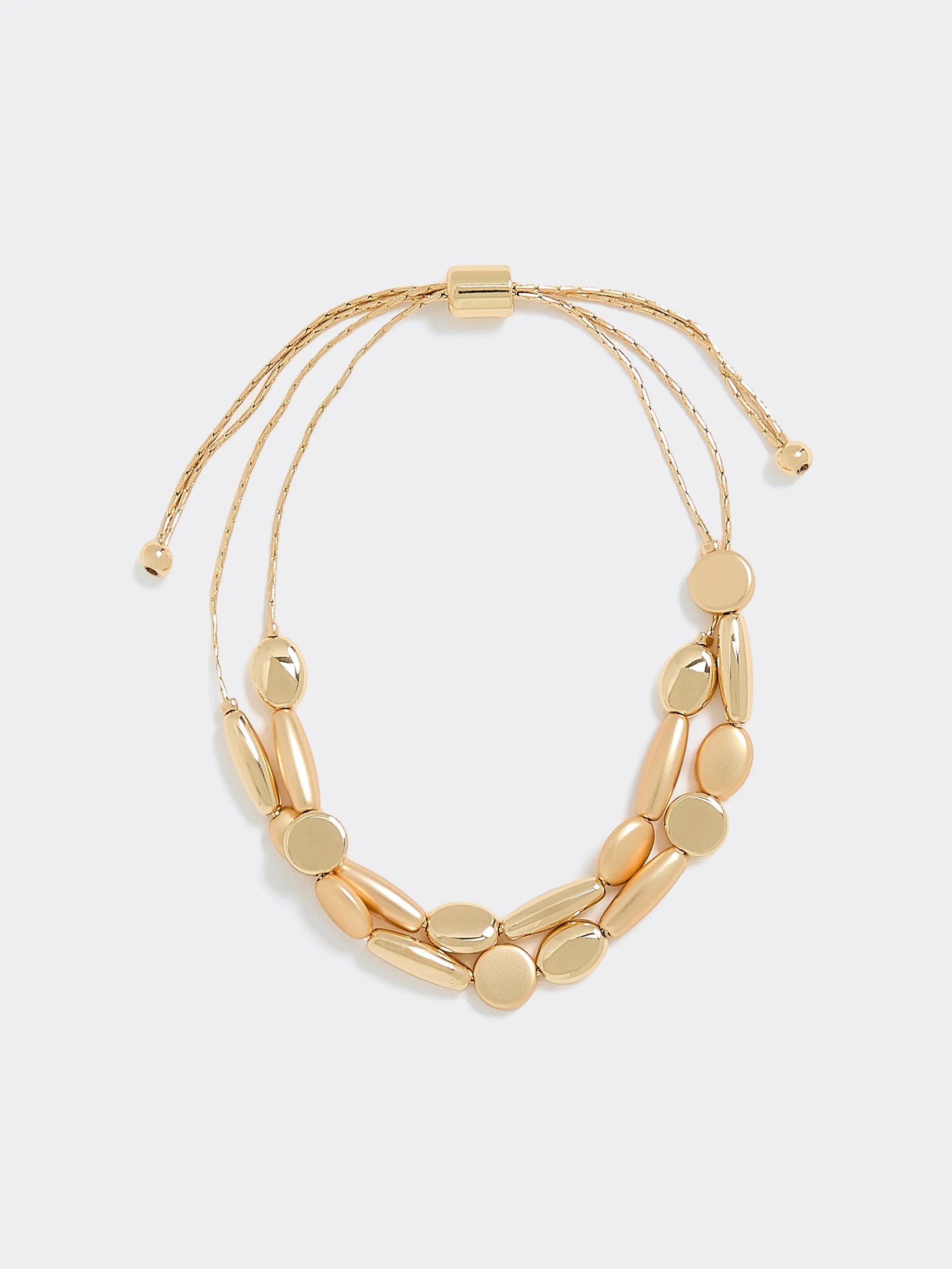 Cord Bracelet with Pebble Beads sold by Reitmans