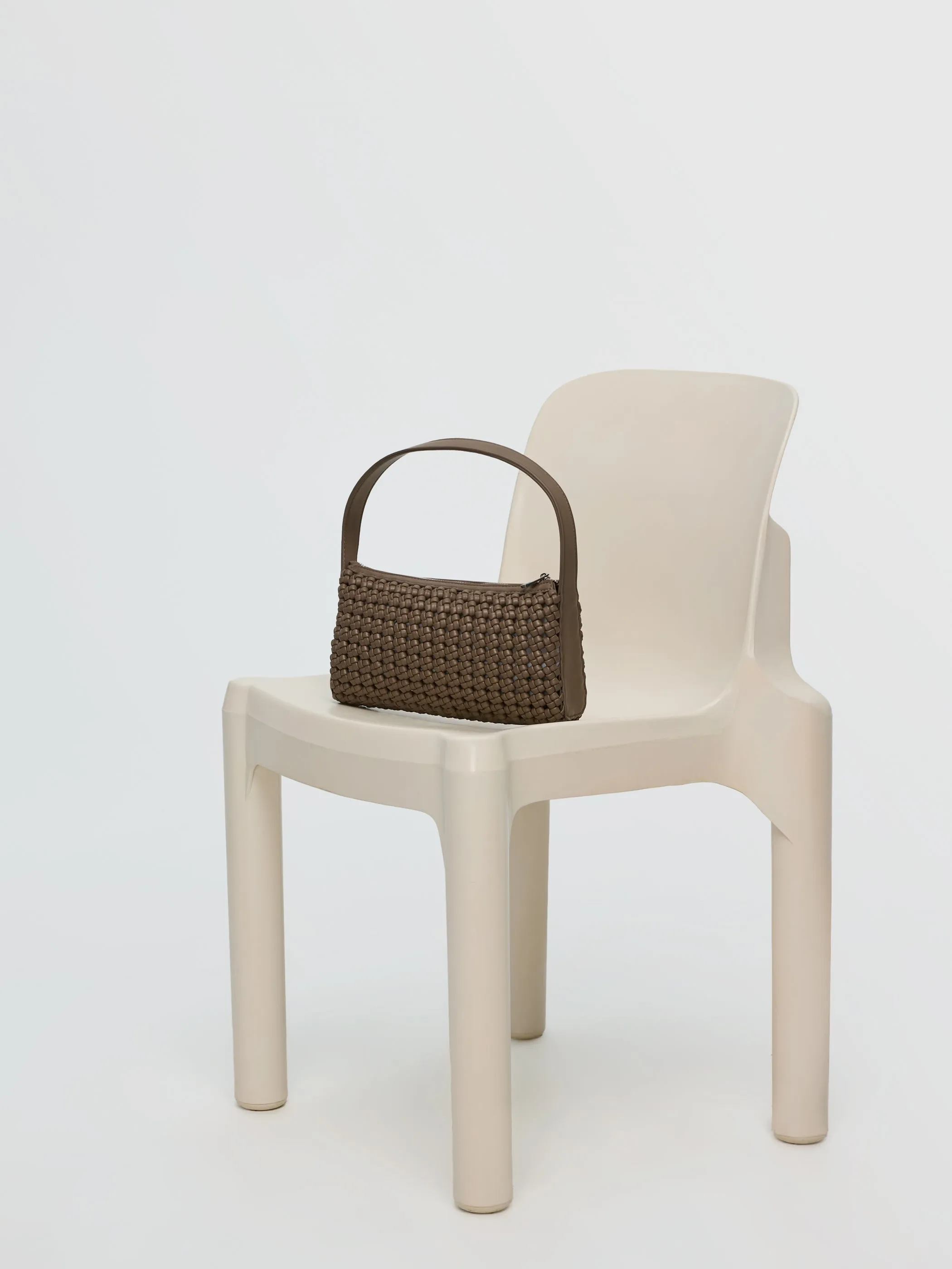 Woven Shoulder Bag sold by Reitmans