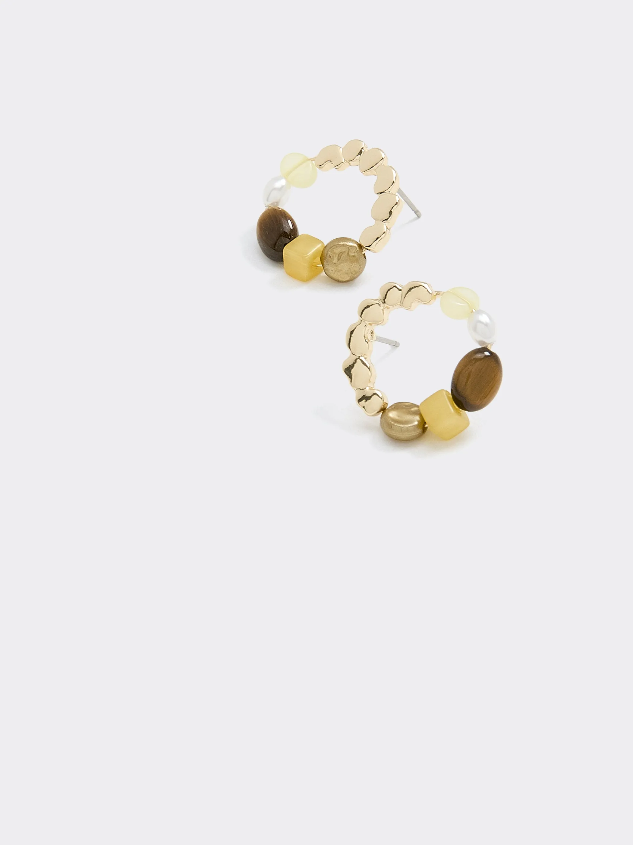 Circular Earrings with Stones sold by Reitmans