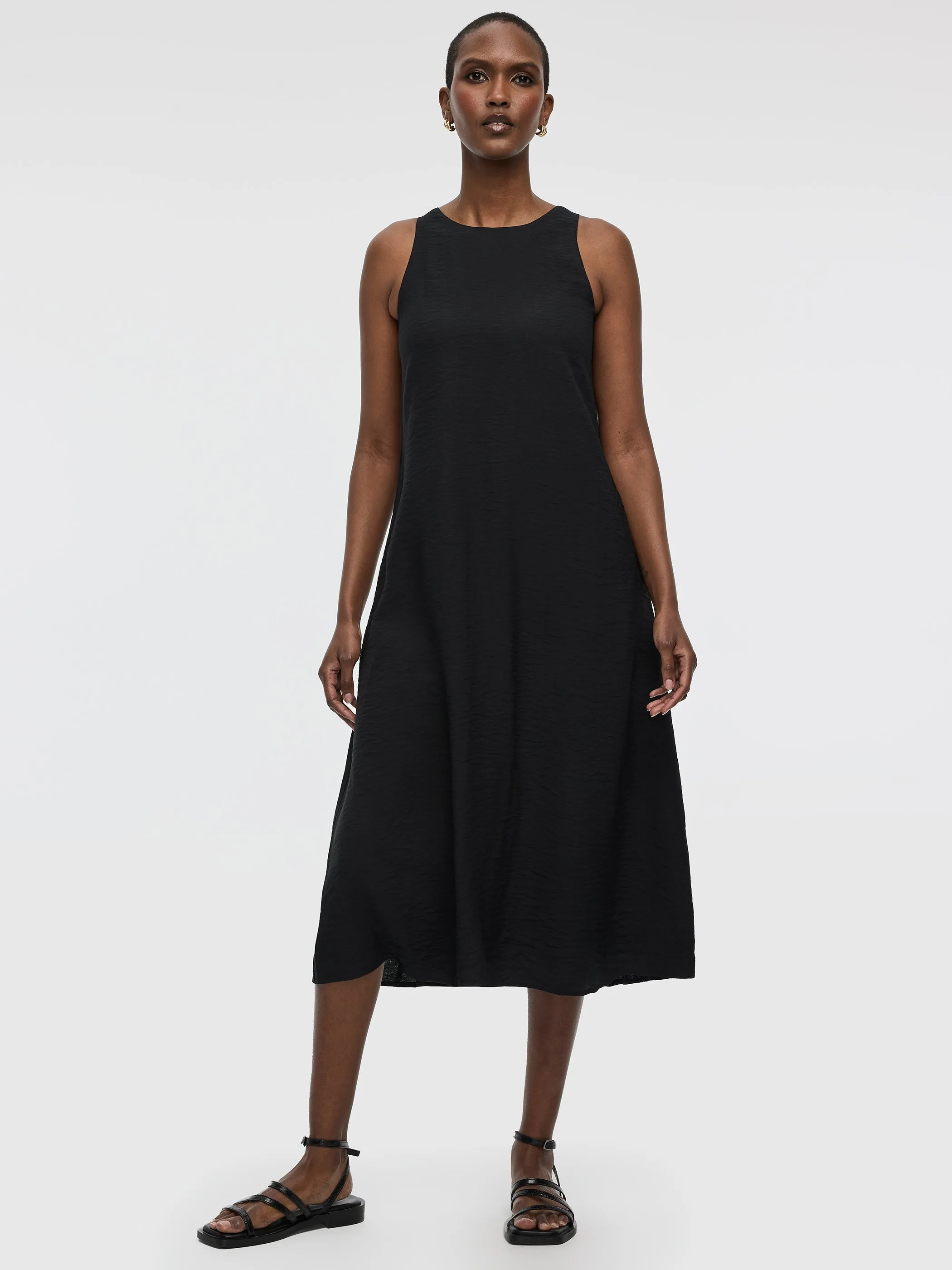 Sleeveless Midi Dress sold by Reitmans