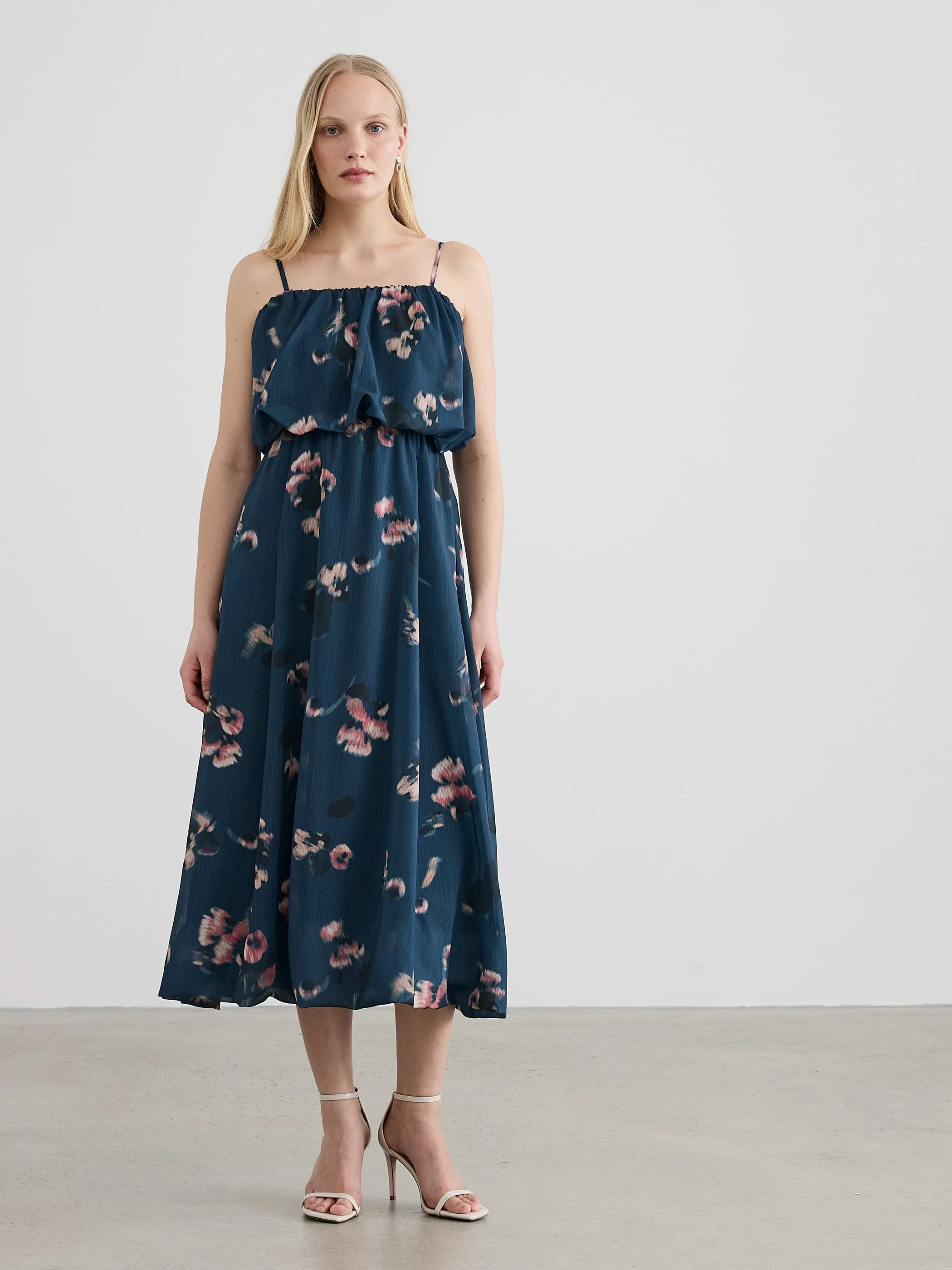 Sleeveless Bubble Maxi Dress sold by Reitmans