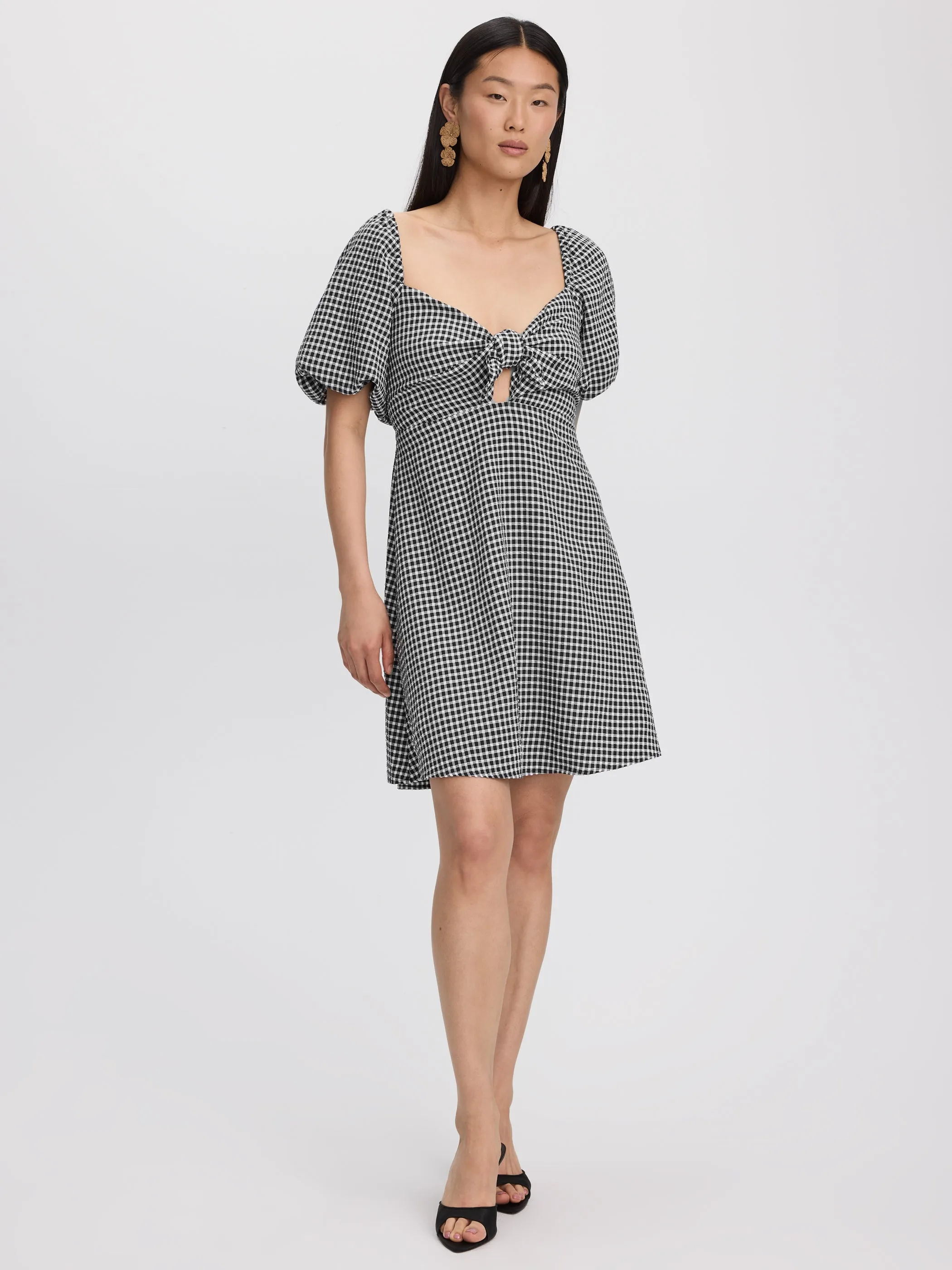 Short-Puffy-Sleeve Mini Dress with Sweetheart Neckline sold by Reitmans