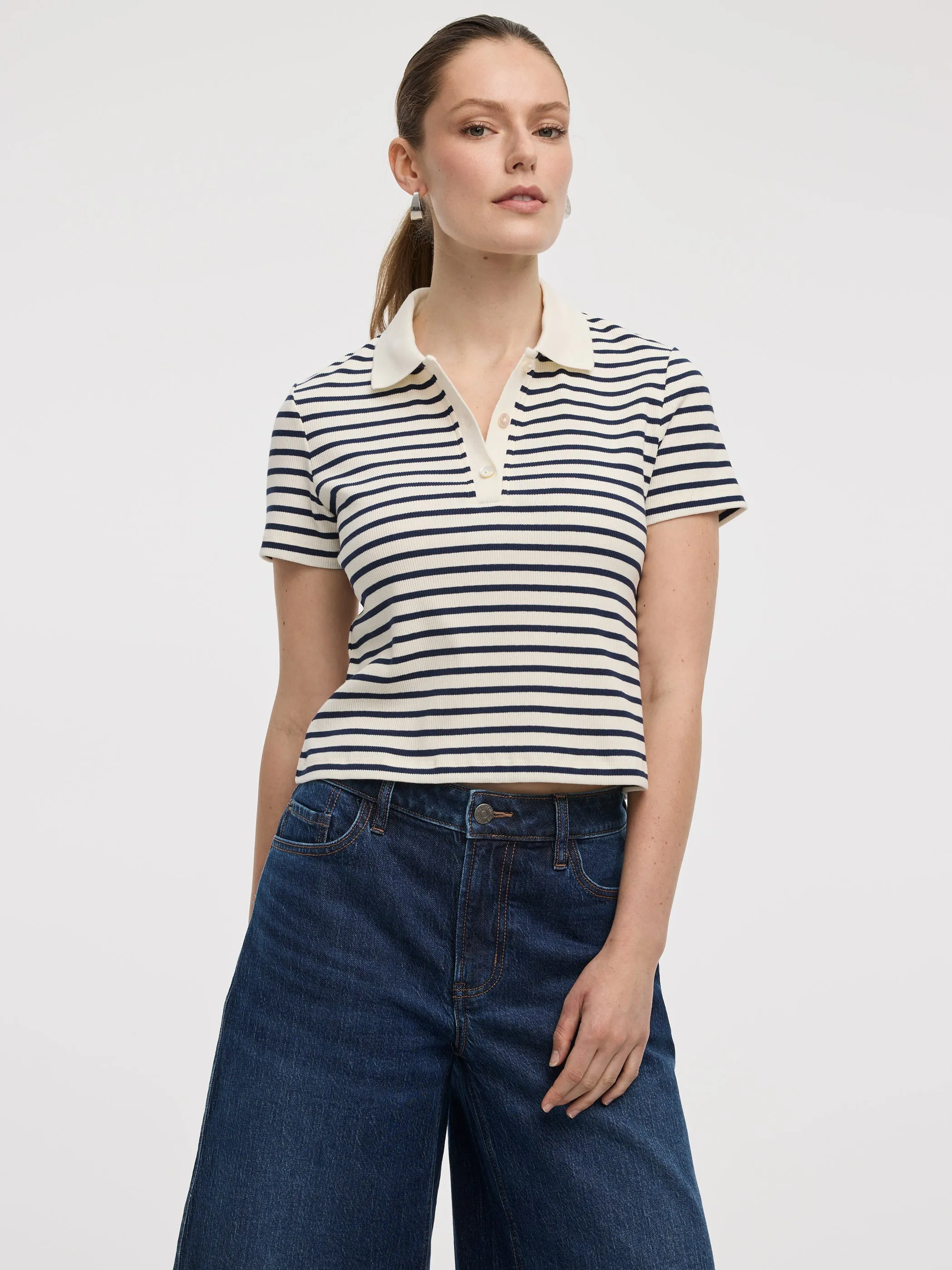 Striped Short-Sleeve Polo Sweater sold by Reitmans