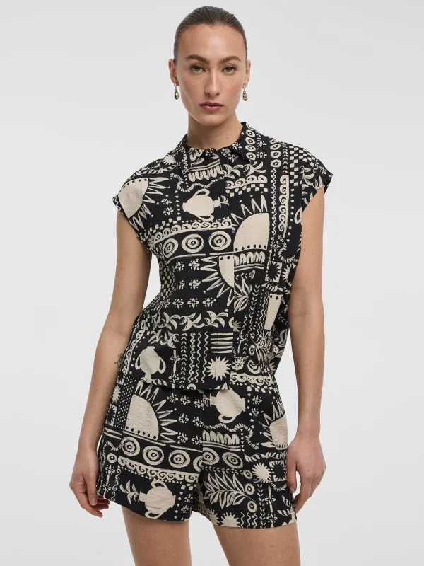 Extended-Sleeve Buttoned-Down Blouse made by Reitmans