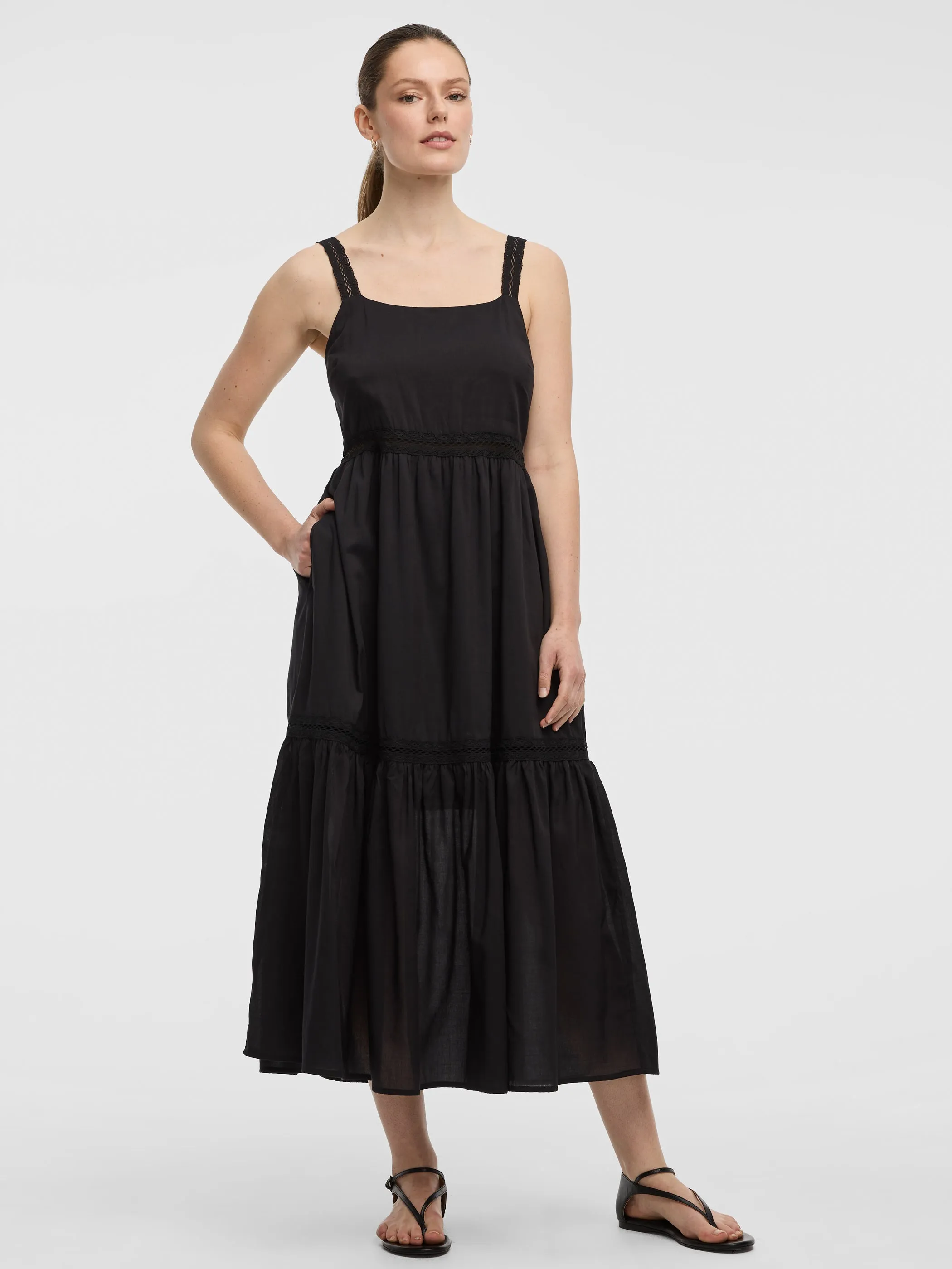 Sleeveless Square-Neck Maxi Dress with Crochet Trims sold by Reitmans