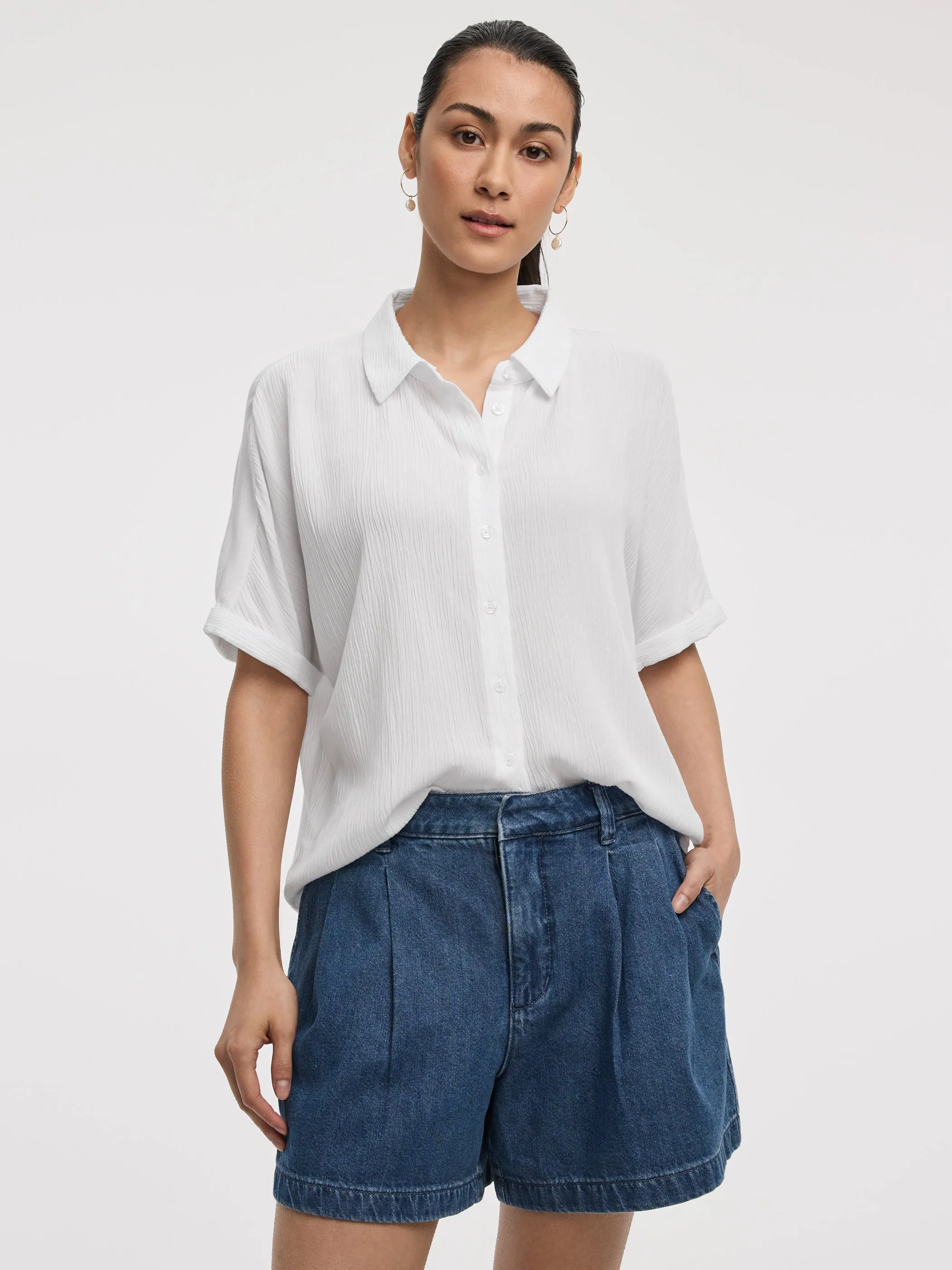 Buttoned-Down Gauze Shirt sold by Reitmans