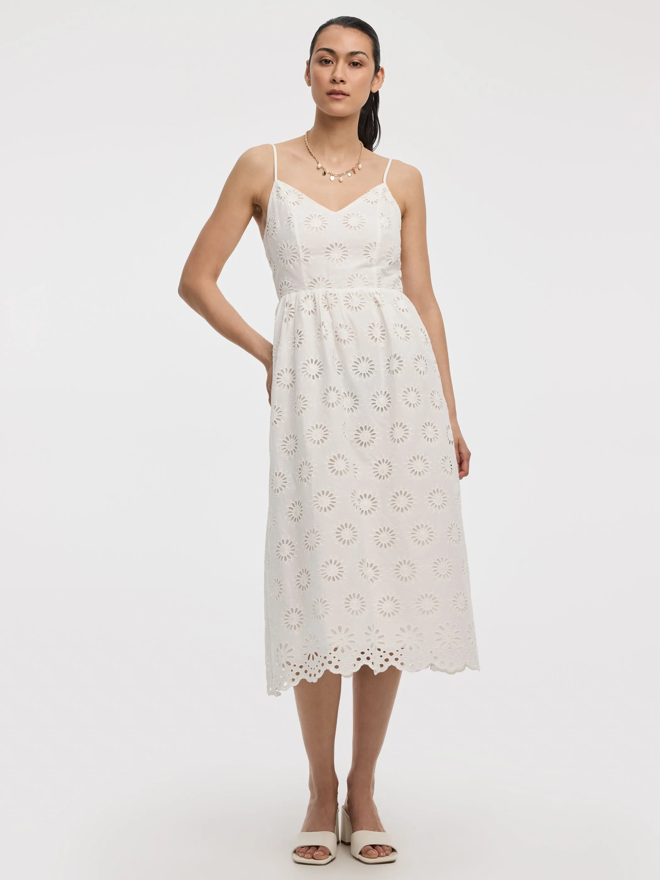 Sleeveless Midi Eyelet Dress with Sweetheart Neckline sold by Reitmans