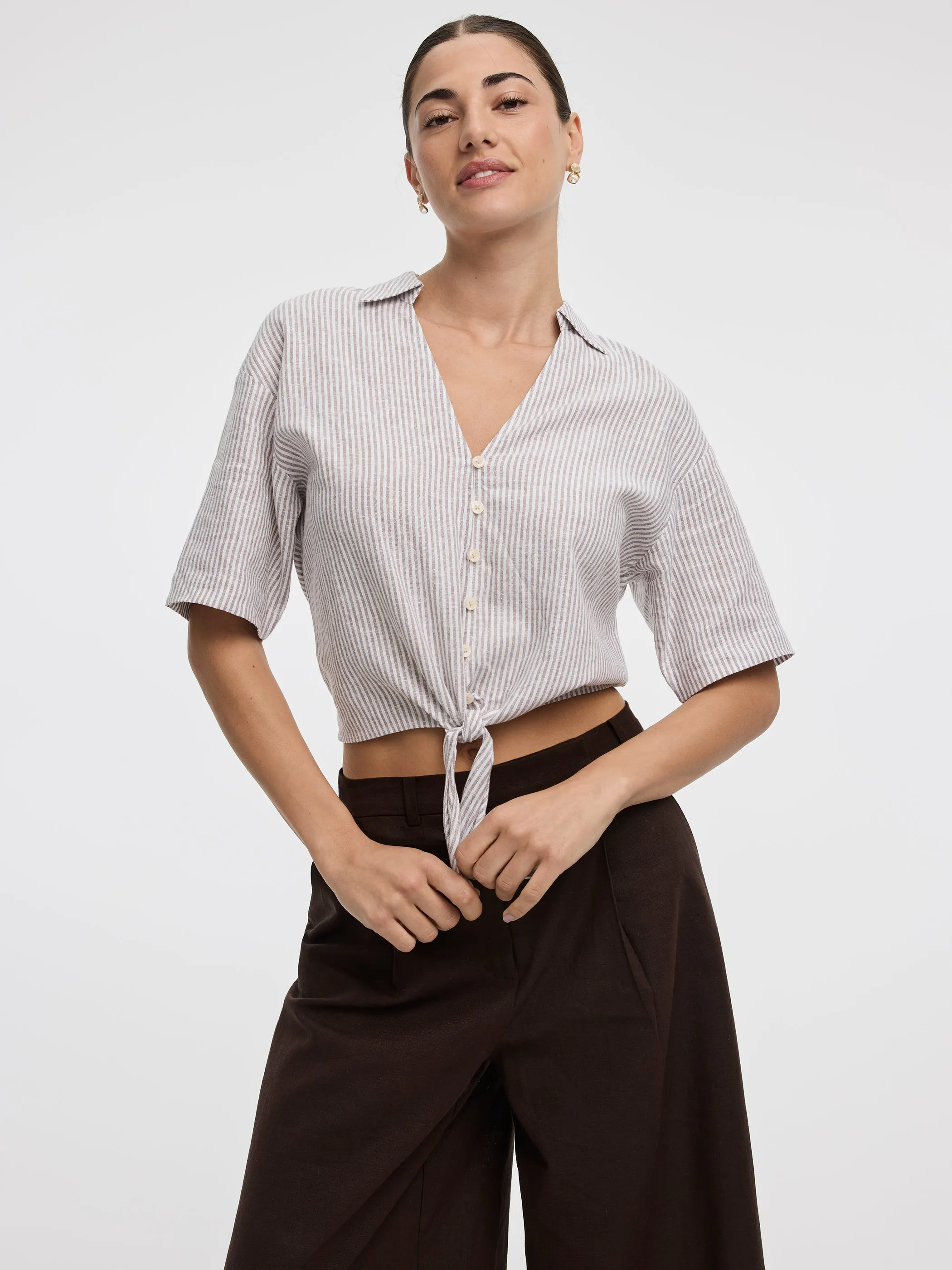Striped Short-Sleeve V-Neck Blouse with Self-Tie Closure sold by Reitmans