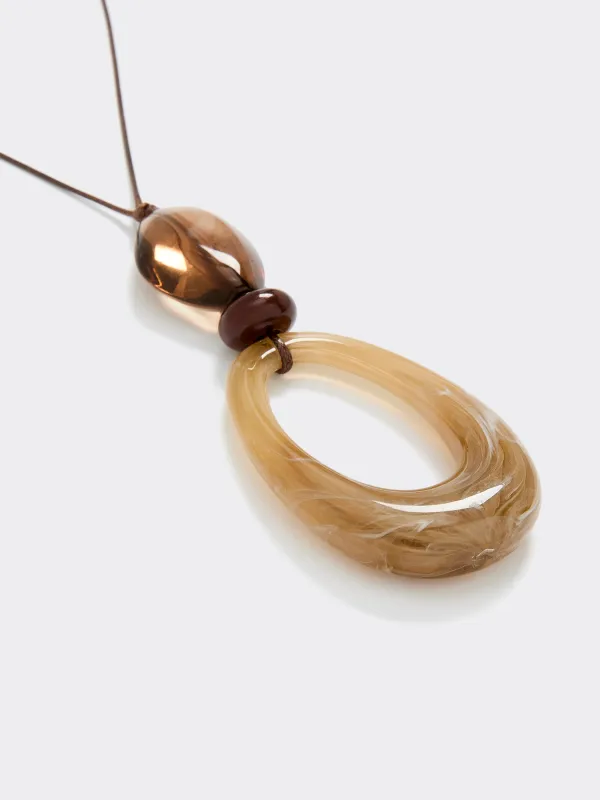 Cord Necklace with Resin Pendant made by Reitmans