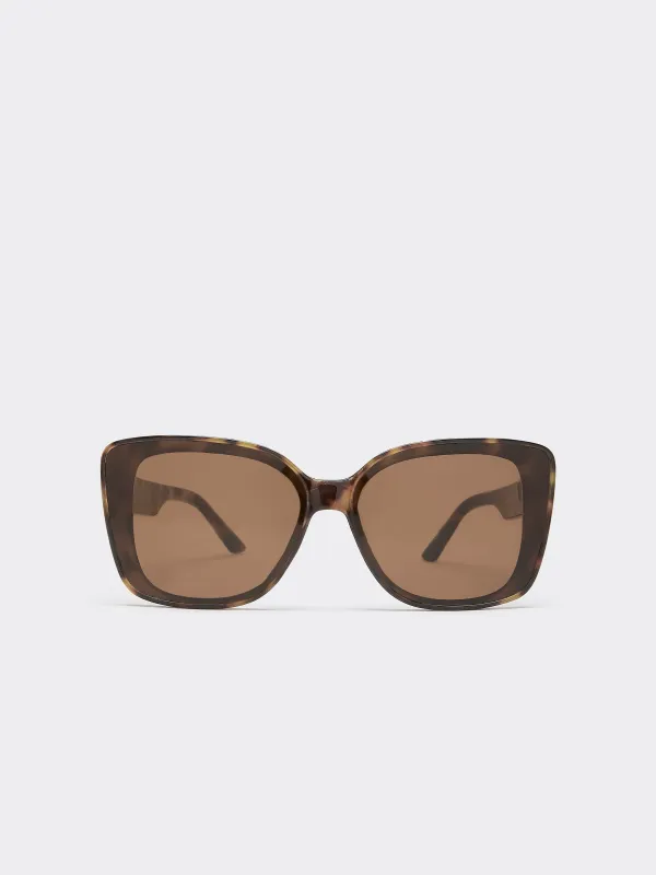 Modern Cat Eye Sunglasses made by Reitmans