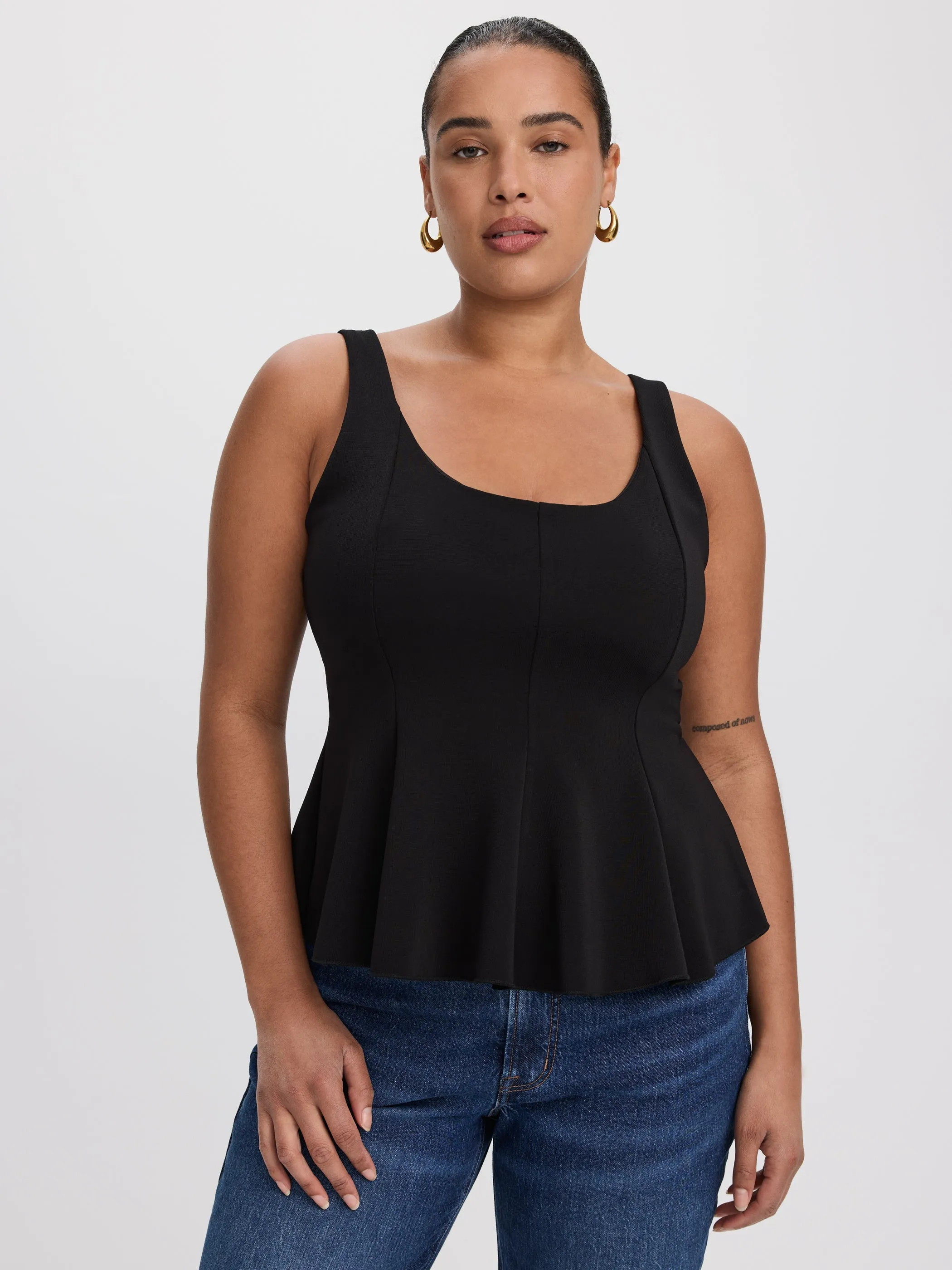 Scoop-Neck Peplum Cami sold by Reitmans
