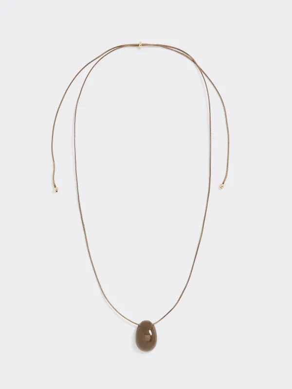 Cord Necklace with Pendant made by Reitmans