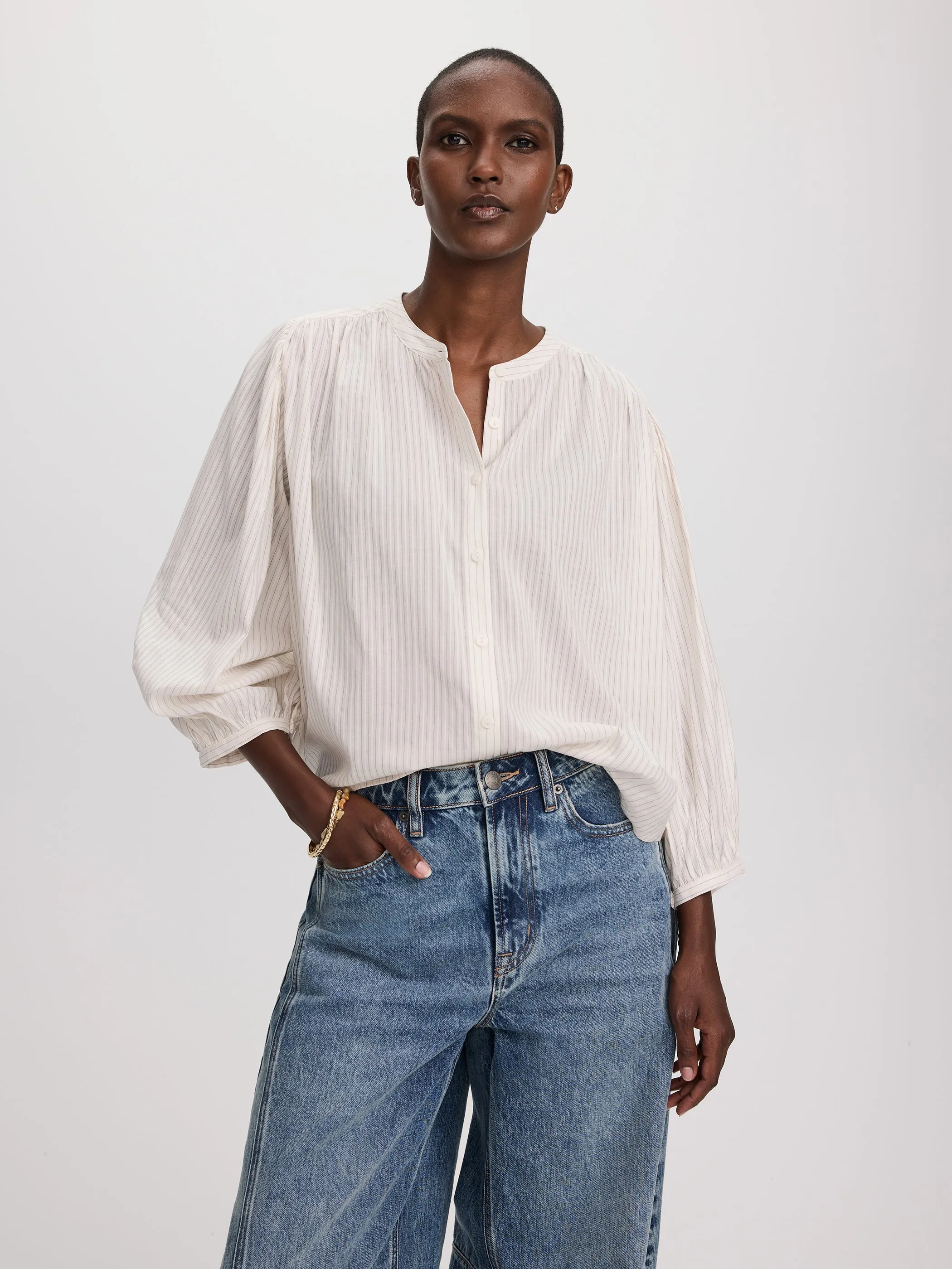3/4-Sleeve Striped Blouse sold by Reitmans
