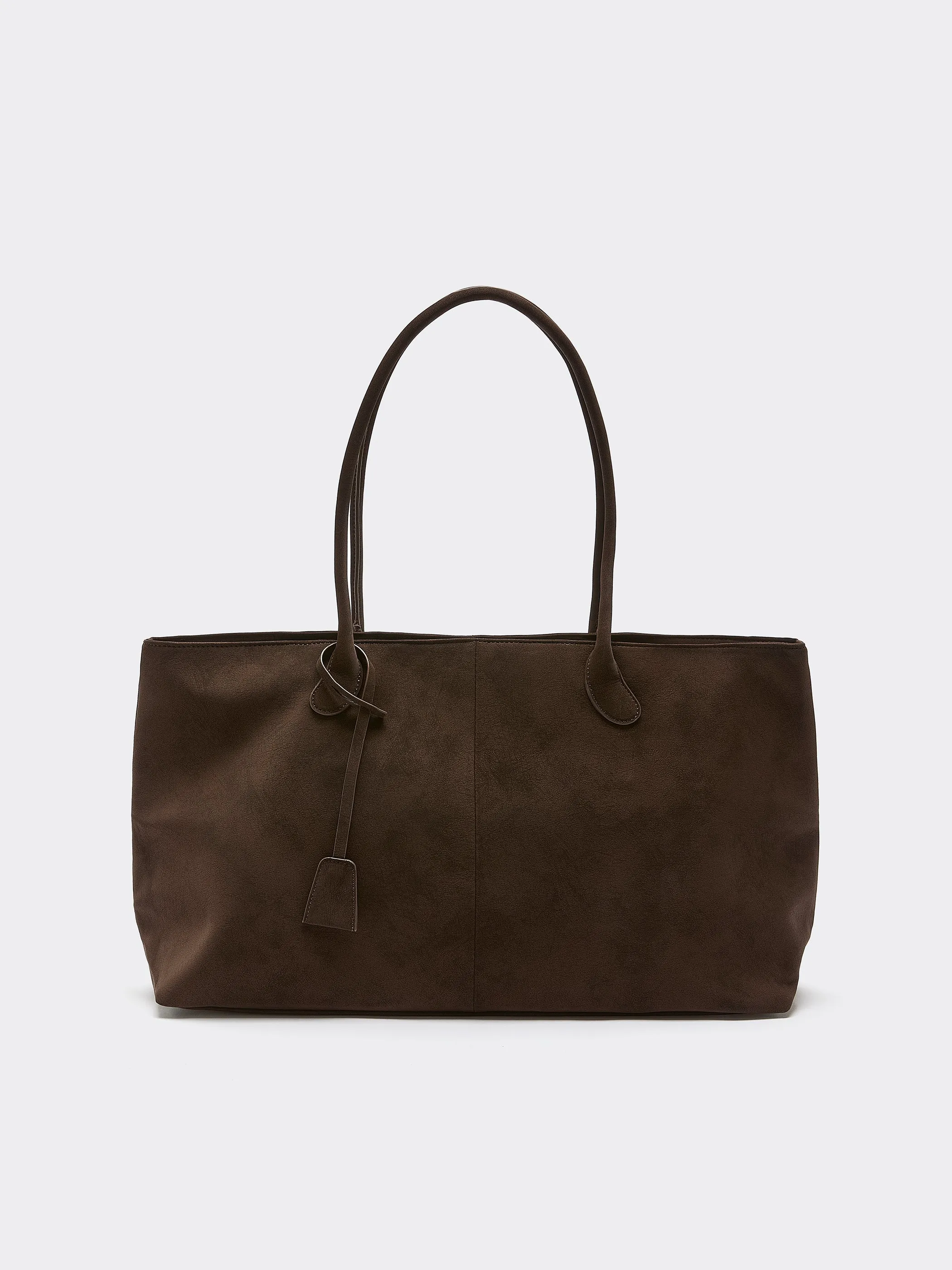 Faux Suede Tote Bag sold by Reitmans