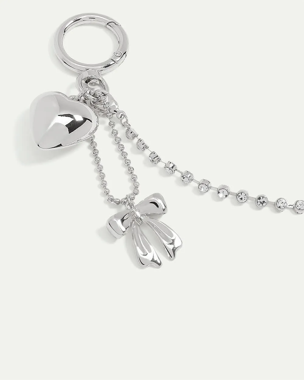 Keychain with Heart and Bow Charms sold by Reitmans