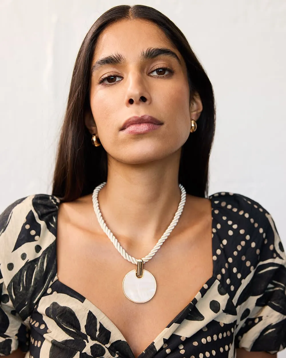 Necklace with Shell Disc Pendant sold by Reitmans