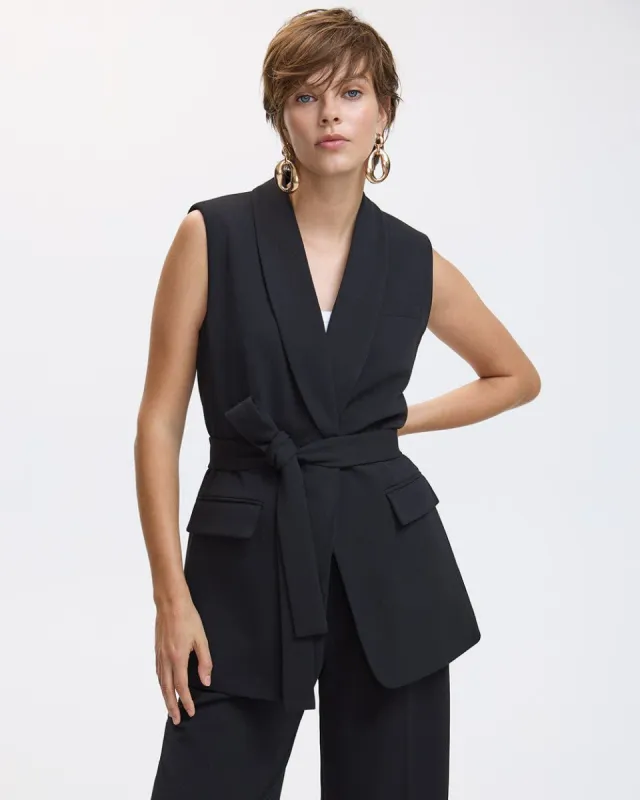 Sleeveless Belted Jacket sold by Reitmans