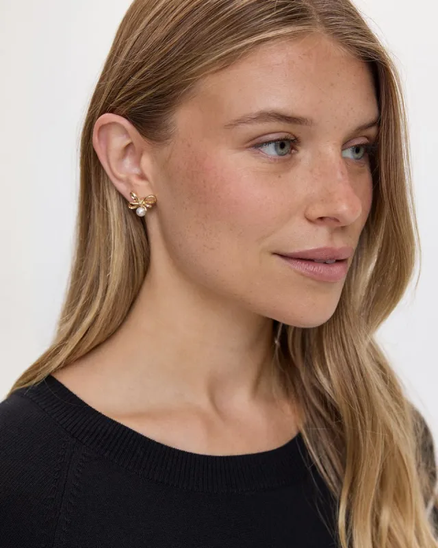 Earrings with Pearl Flowers sold by Reitmans