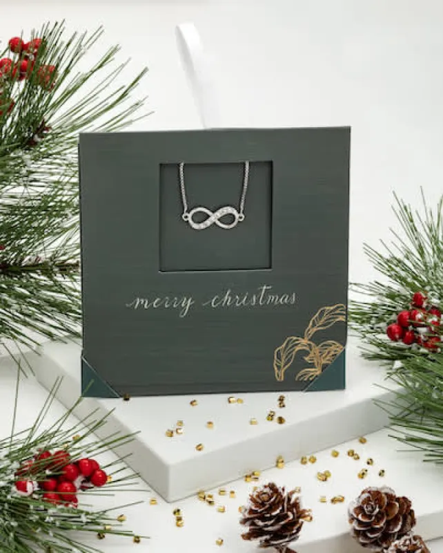Holiday Gift Envelope with Clear Crystal Infinity Adjustable Bracelet  - callura sold by Reitmans