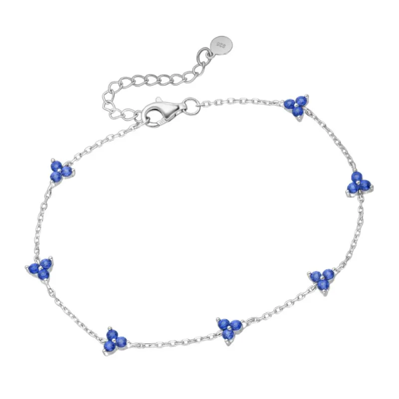 Blue Topaz Flower Charm Bracelet - 925 Sterling Silver - Ag Sterling sold by Reitmans
