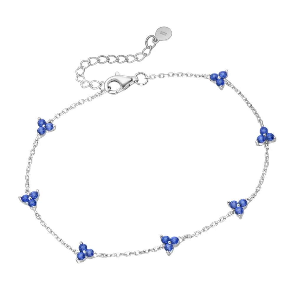 Blue Topaz Flower Charm Bracelet - 925 Sterling Silver - Ag Sterling sold by Reitmans