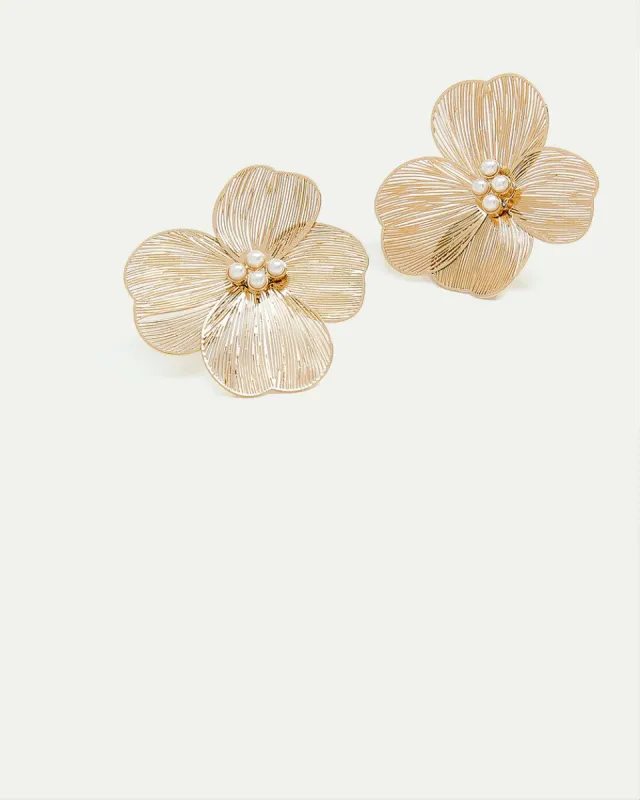 Flower Earrings with Pearls sold by Reitmans