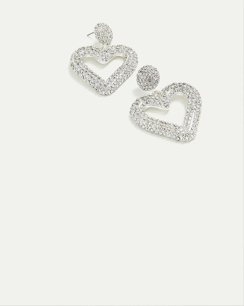 Shiny Earrings with Large Heart Pendant sold by Reitmans