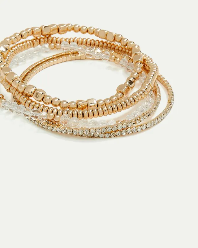 Elastic Bracelets with Clear Beads and Stones - Set of 4 sold by Reitmans