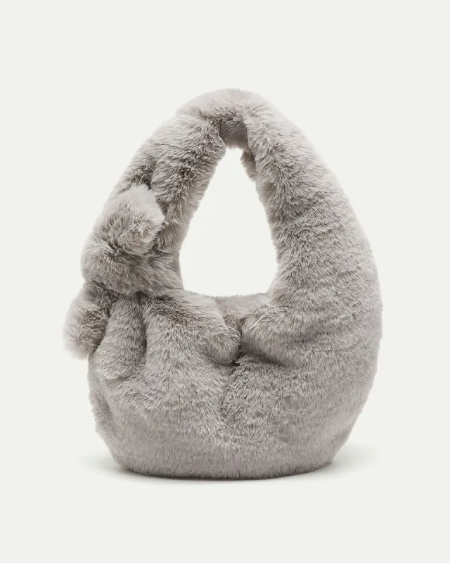Faux Fur Bag sold by Reitmans