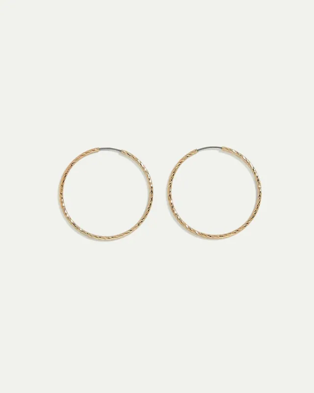 Small Textured Hoop Earrings sold by Reitmans