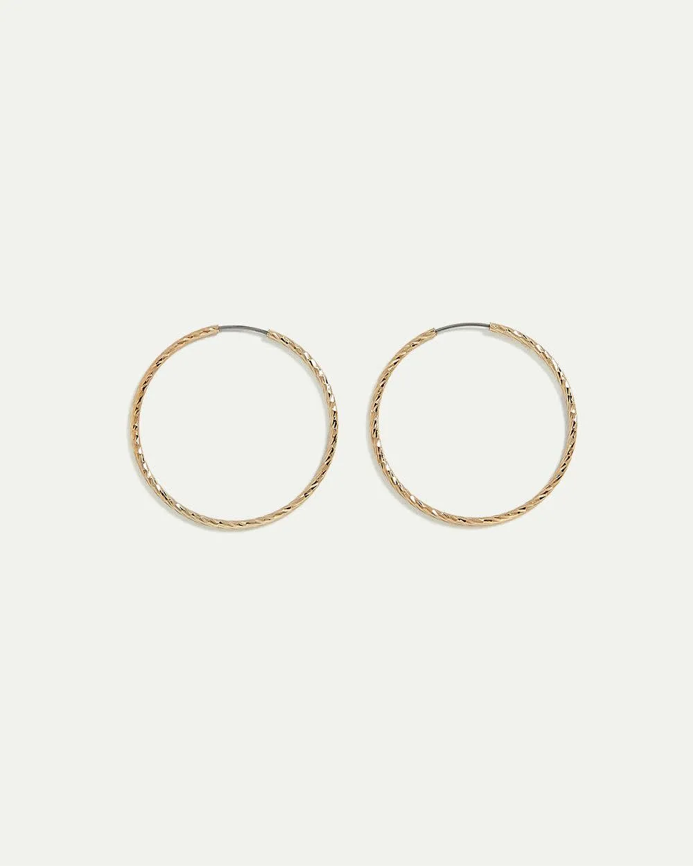 Small Textured Hoop Earrings sold by Reitmans
