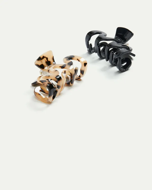 Swirl Hair Clips - Set of 2 sold by Reitmans