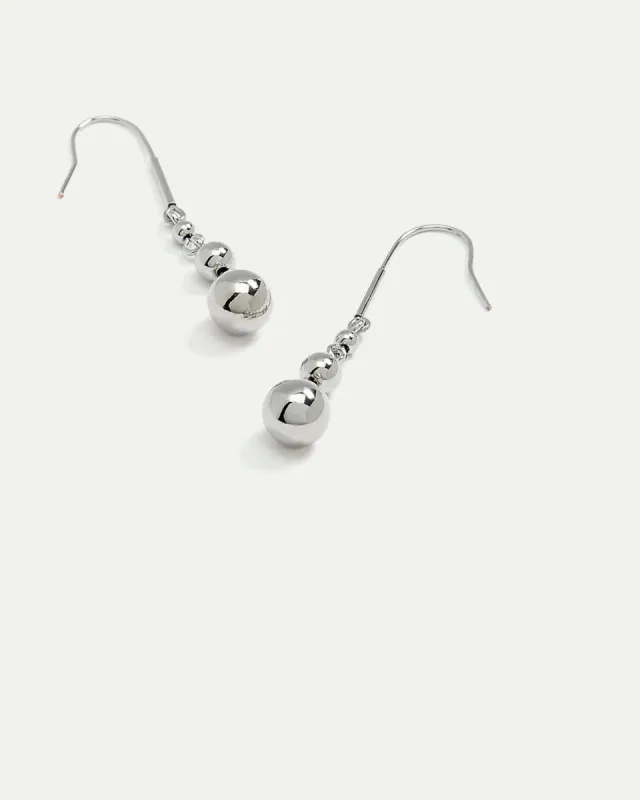 Pendant Earrings with Small Ball Drops sold by Reitmans