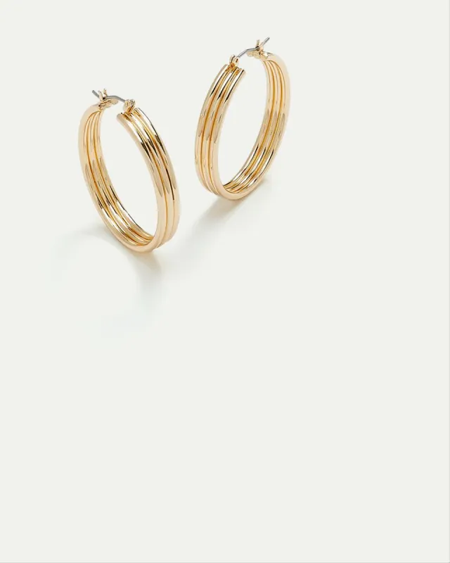 Large Hinged Hoops with Ridges sold by Reitmans