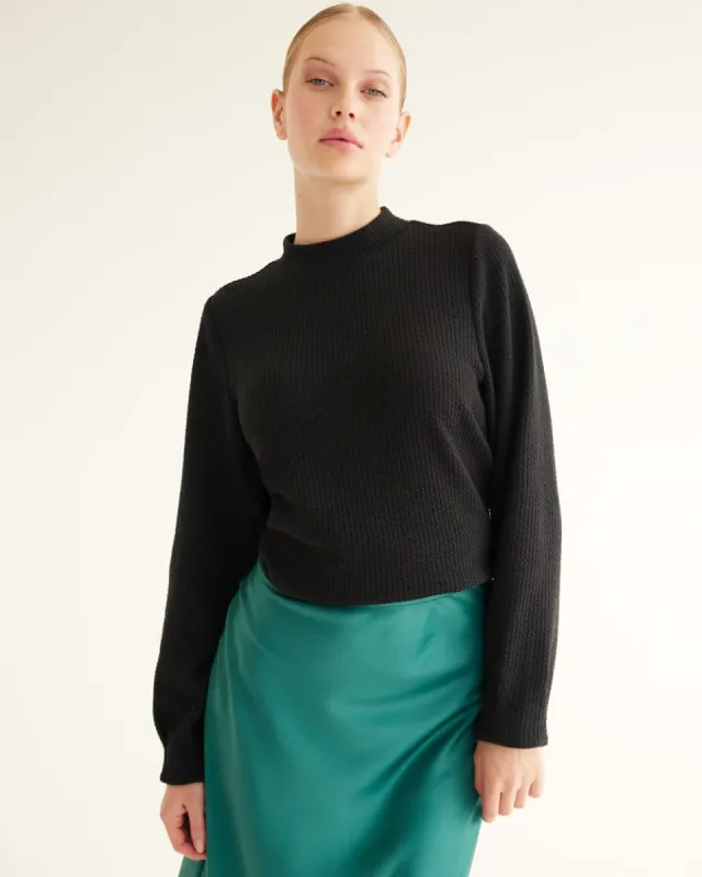 Long-Puffy-Sleeve Mock-Neck Top sold by Reitmans