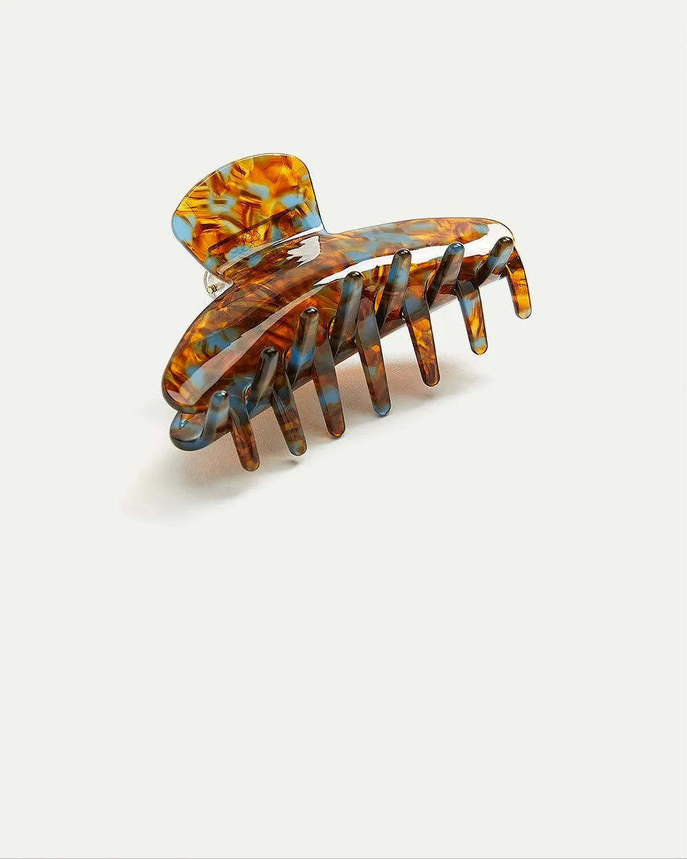 Multicoloured Brown Claw Clip sold by Reitmans