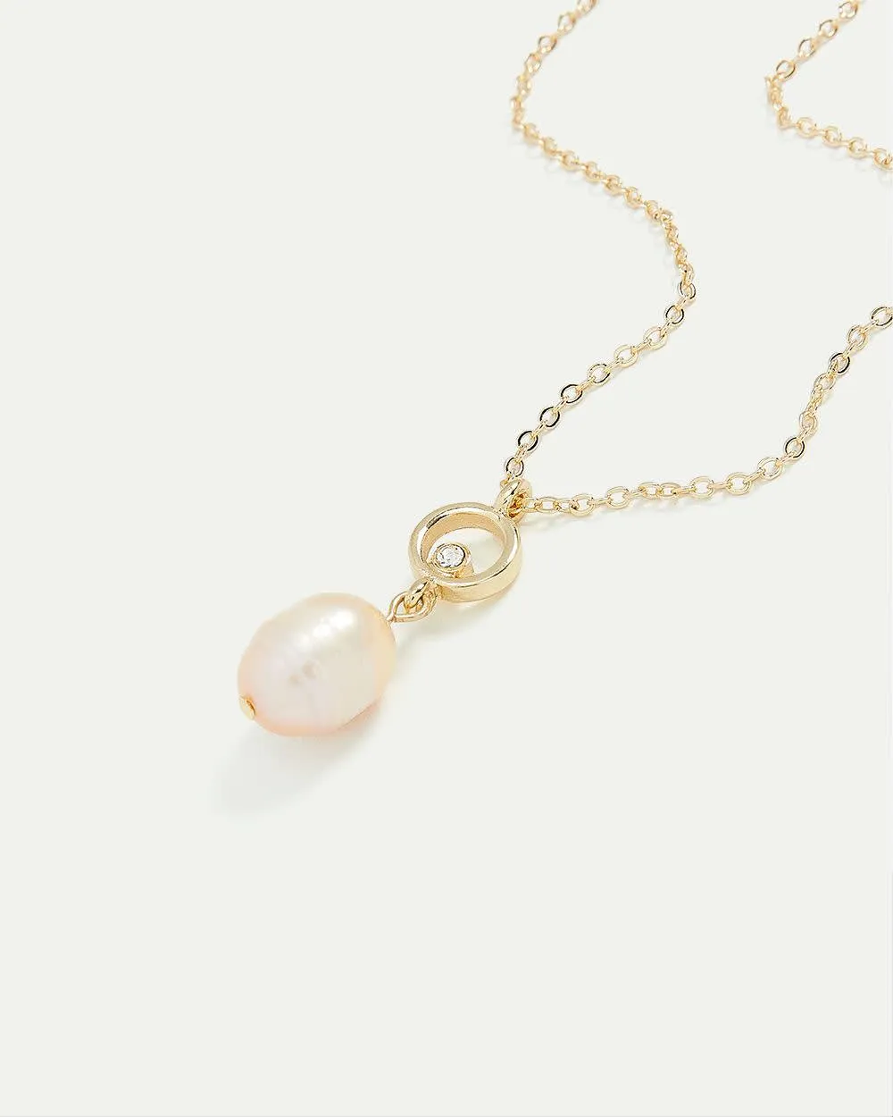 Long Necklace with Large Pearl Pendant sold by Reitmans