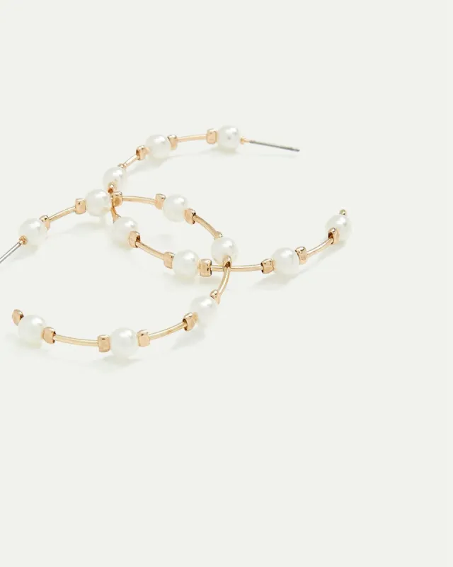 Open Hoops with Pearls sold by Reitmans