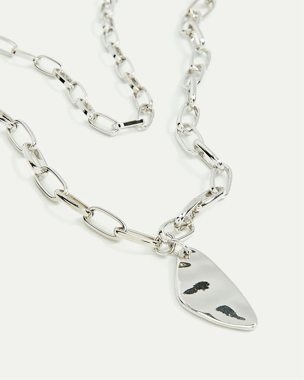 Short Paperclip Chain with Unique Pendant sold by Reitmans