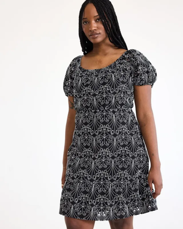 Short-Flutter-Sleeve Wrap Eyelet Dress sold by Reitmans