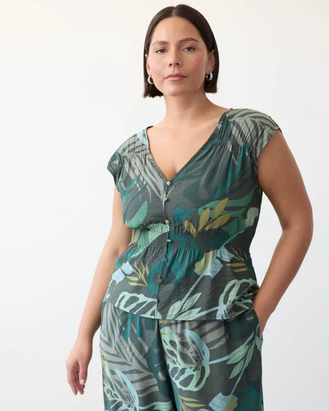 Sleeveless V-Neck Blouse with Smocked Waist sold by Reitmans