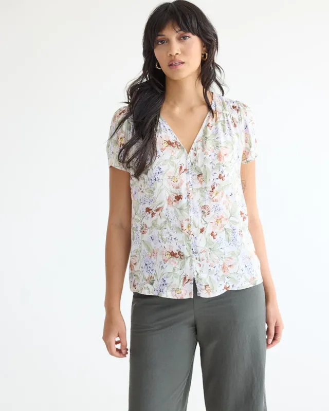 V-Neck Buttoned-Down Blouse with Short Flutter Sleeves sold by Reitmans