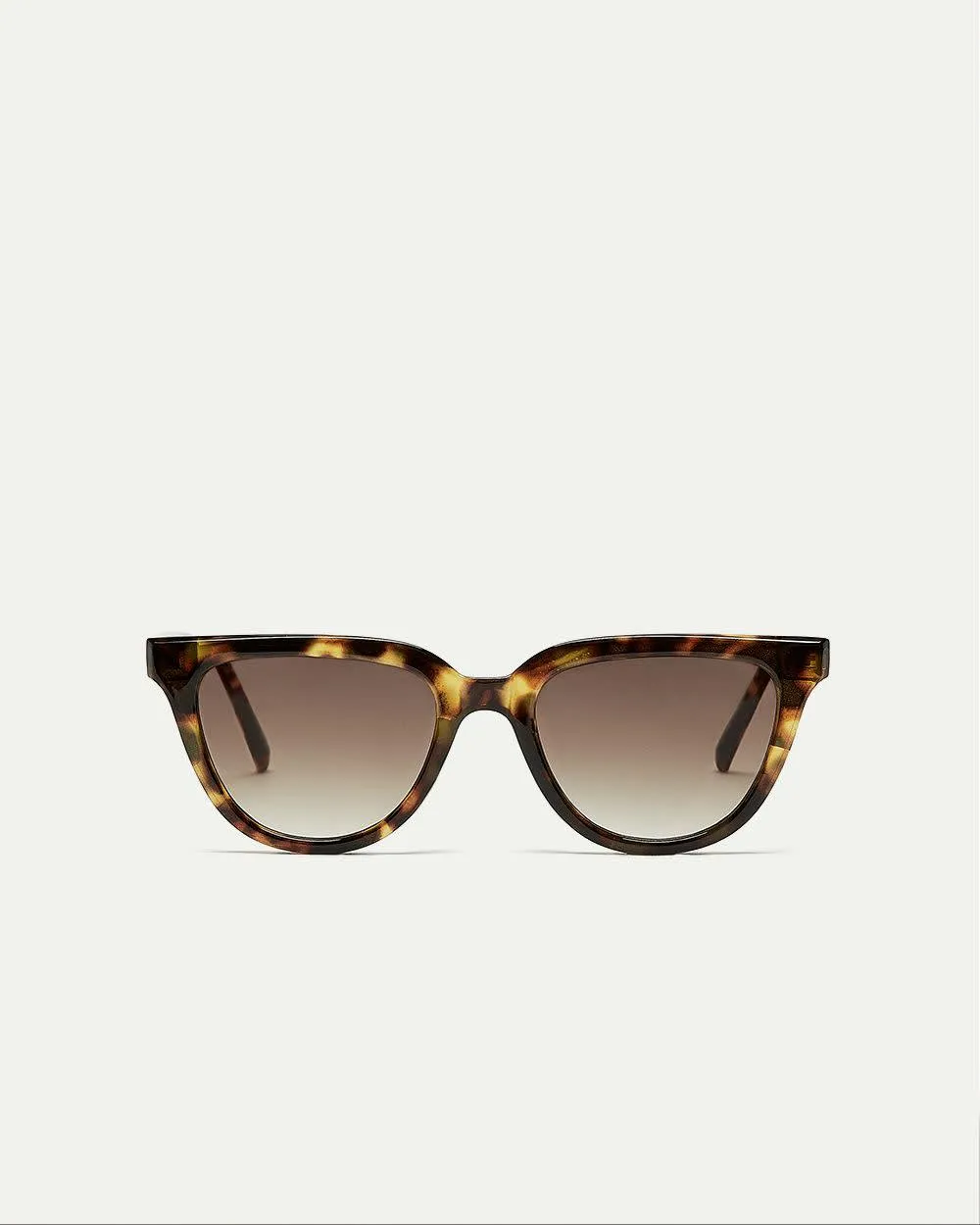 Rounded Tortoise Sunglasses sold by Reitmans