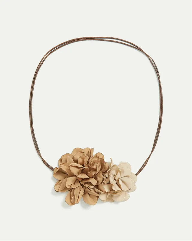 Flower Choker sold by Reitmans
